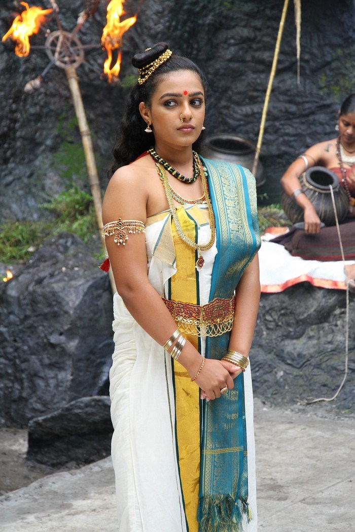 Nithya Menon Hot Pics in Urumi